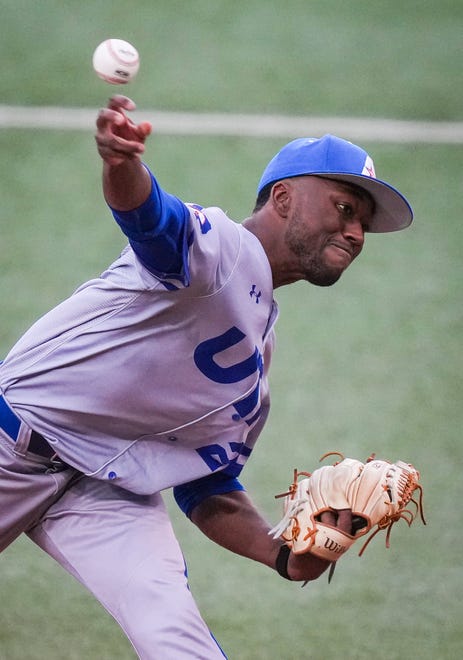 UT Arlington Mavericks pitcher Aaron Calhoun (28) pitches in the second inning of the Longhorns' game against the UT Arlington Mavericks at UFCU Disch-Falk Field, Tuesday, April 23, 2024. Rodriguez is acting head coach while David Pierce is suspended.