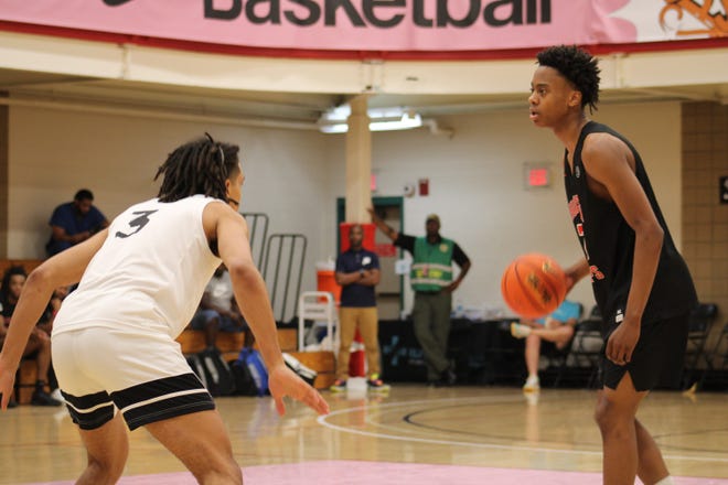 Tre Johnson faces up a defender during an AAU basketball game July 4 in the Nike EYBL Peach Jam in South Carolina. Johnson, the No. 4 prospect in the nation, per 247Sports, signed with Texas on Wednesday.