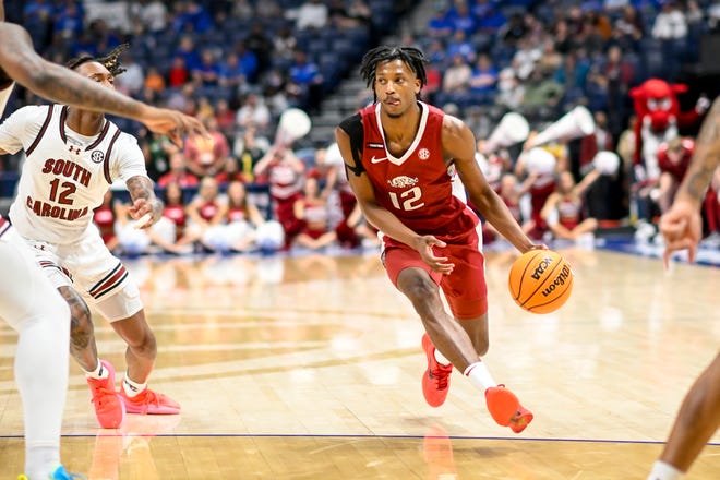 Arkansas guard Tramon Mark drives the ball against South Carolina this past season. Mark, who led Arkansas in scoring in 2023-24 with 16.2 points a game, became the second portal player to commit to Texas on Sunday.